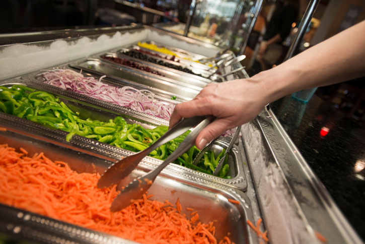 George Mason University student choosing meal
