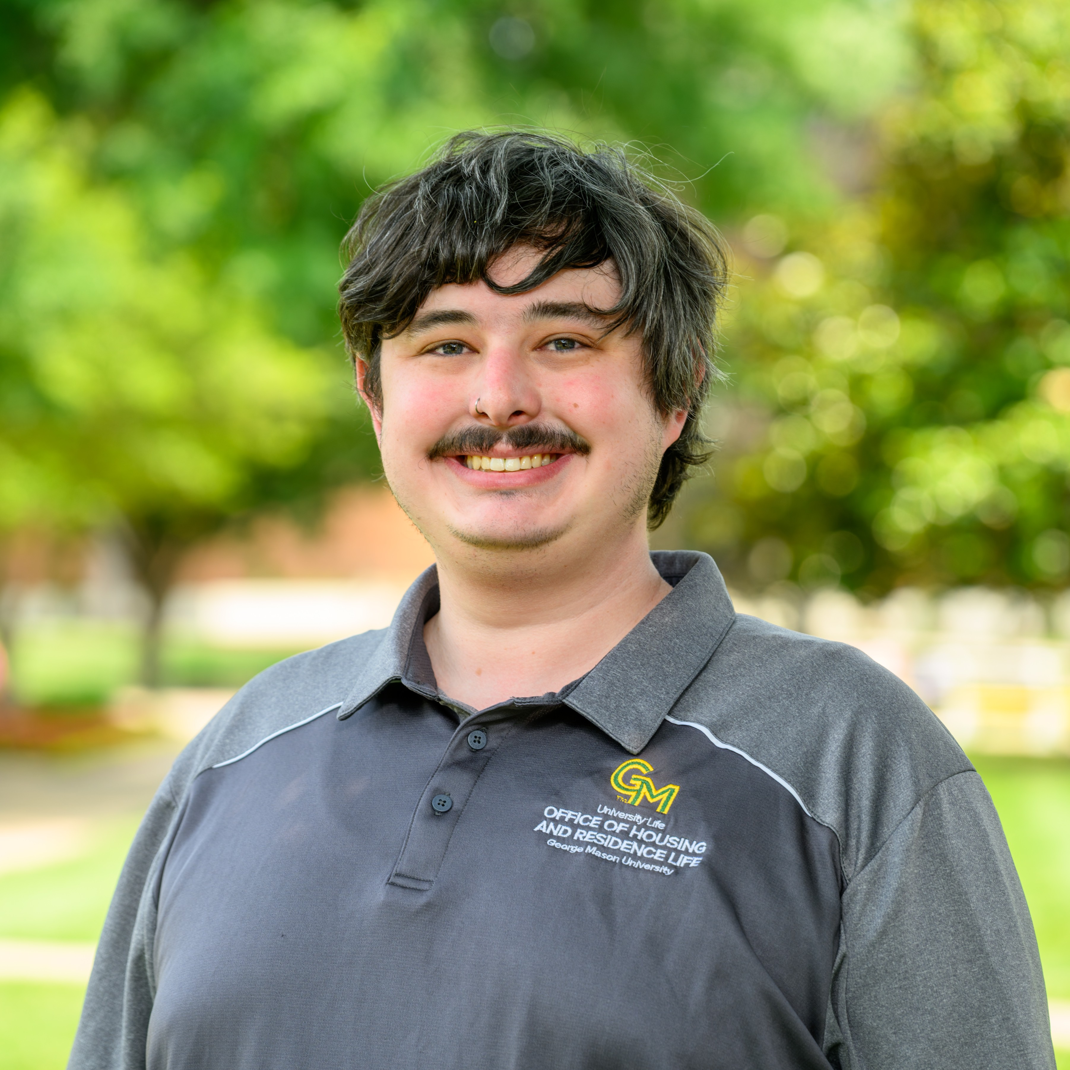 Jo Wilson in Grey Mason Polo Smiling