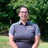 Samantha Ferrigno in a grey mason polo smiling