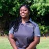Taliyah Rogers in a grey mason polo smiling